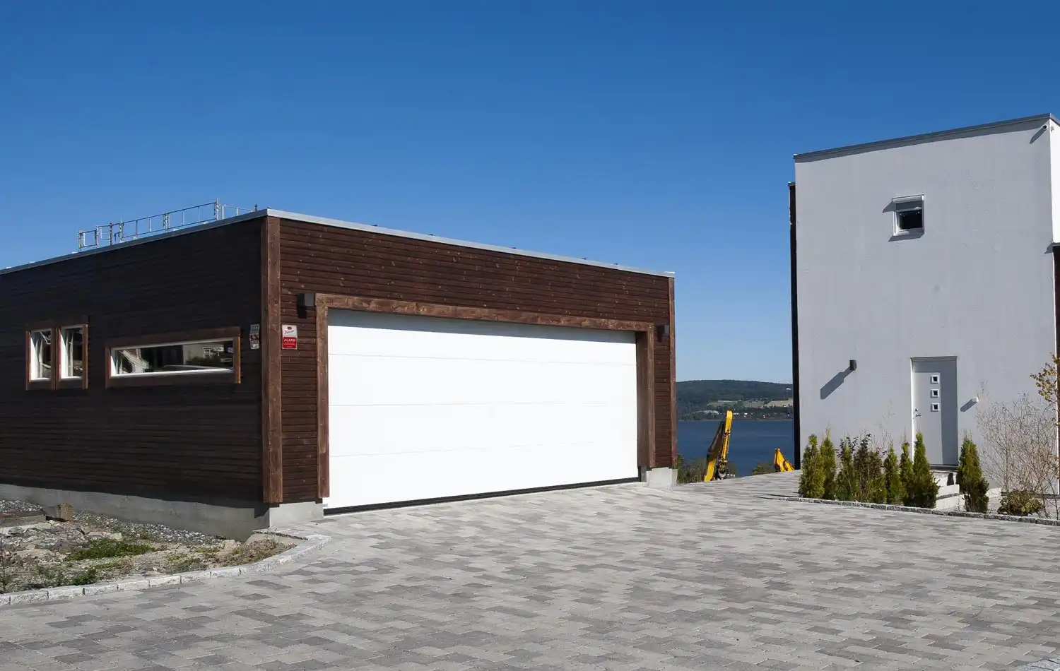 <a href='/bilder/referanser/flatt-tak/karlshusgarasjene_flatt-tak_001.jpg' download>Last ned bilde</a>