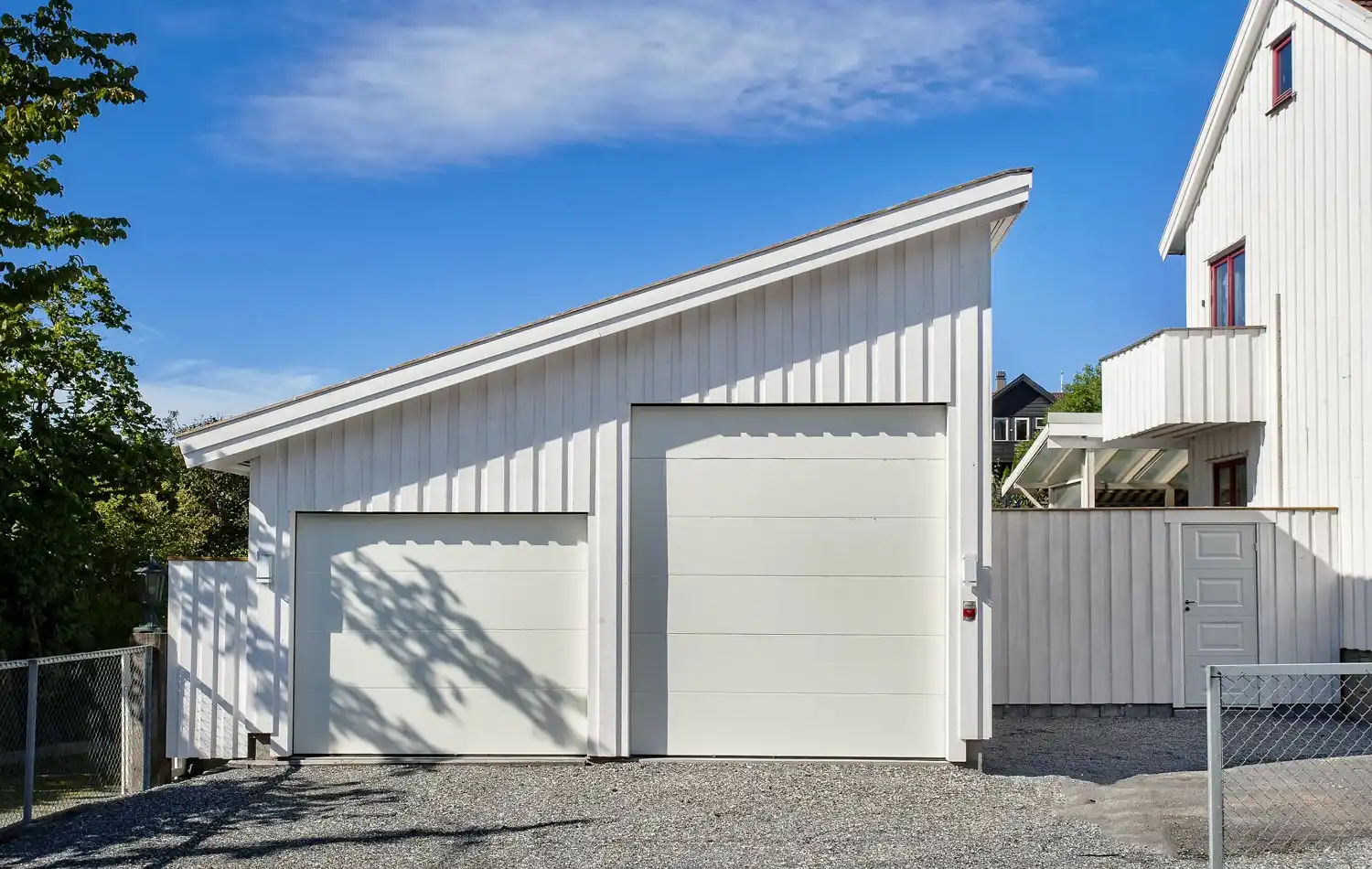 <a href='/bilder/referanser/pulttak/karlshusgarasjene_pulttak_dobbel_005.jpg' download>Last ned bilde</a>