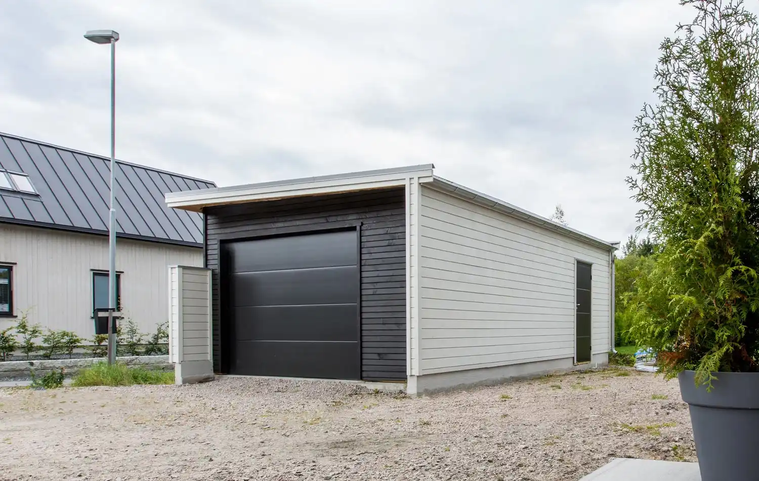 <a href='/bilder/referanser/pulttak/karlshusgarasjene_pulttak_dobbel_012.jpg' download>Last ned bilde</a>