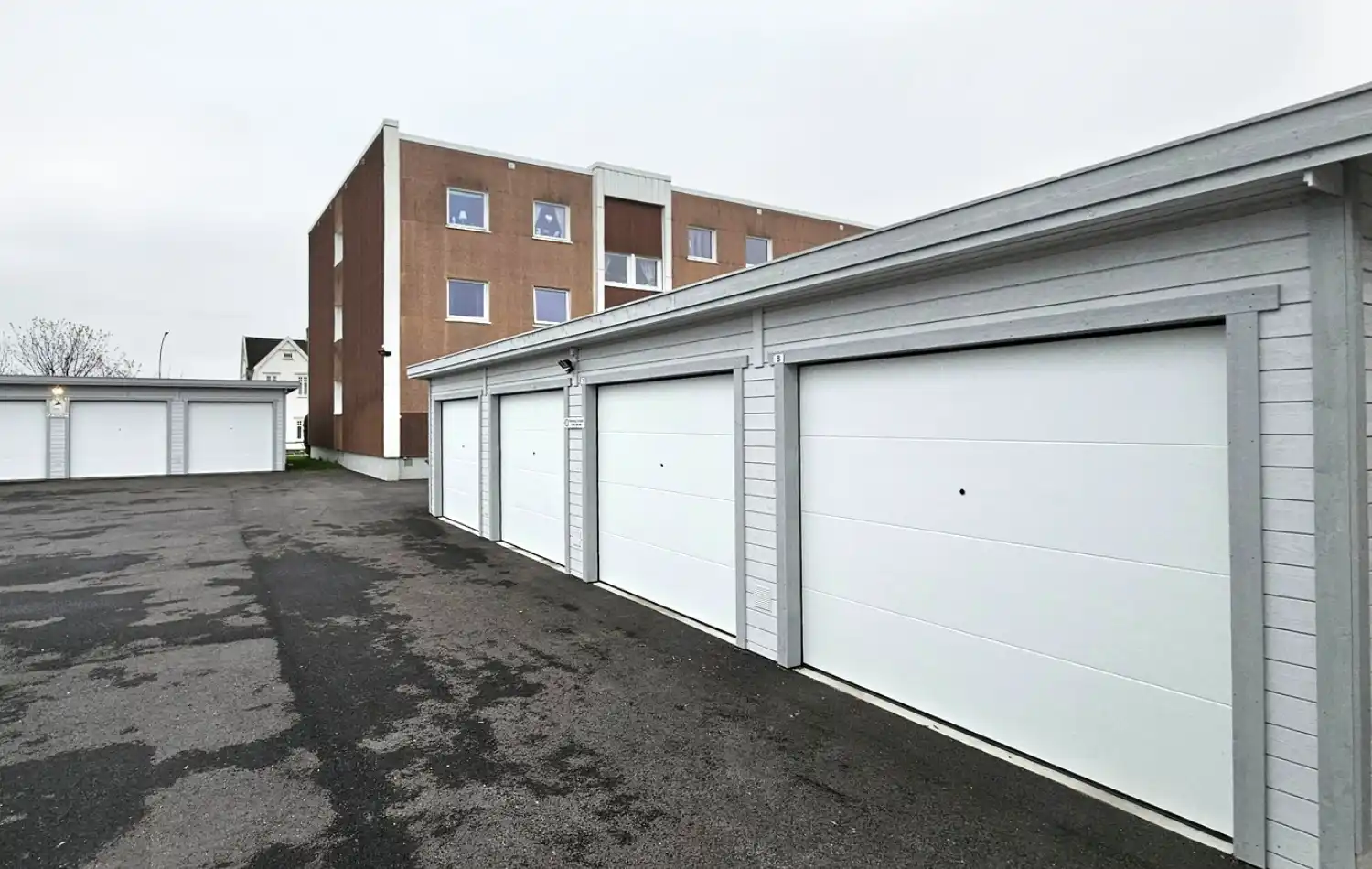 <a href='/bilder/referanser/rekkegarasjer/karlshusgarasjene_rekkegarasjer_011.jpg' download>Last ned bilde</a>