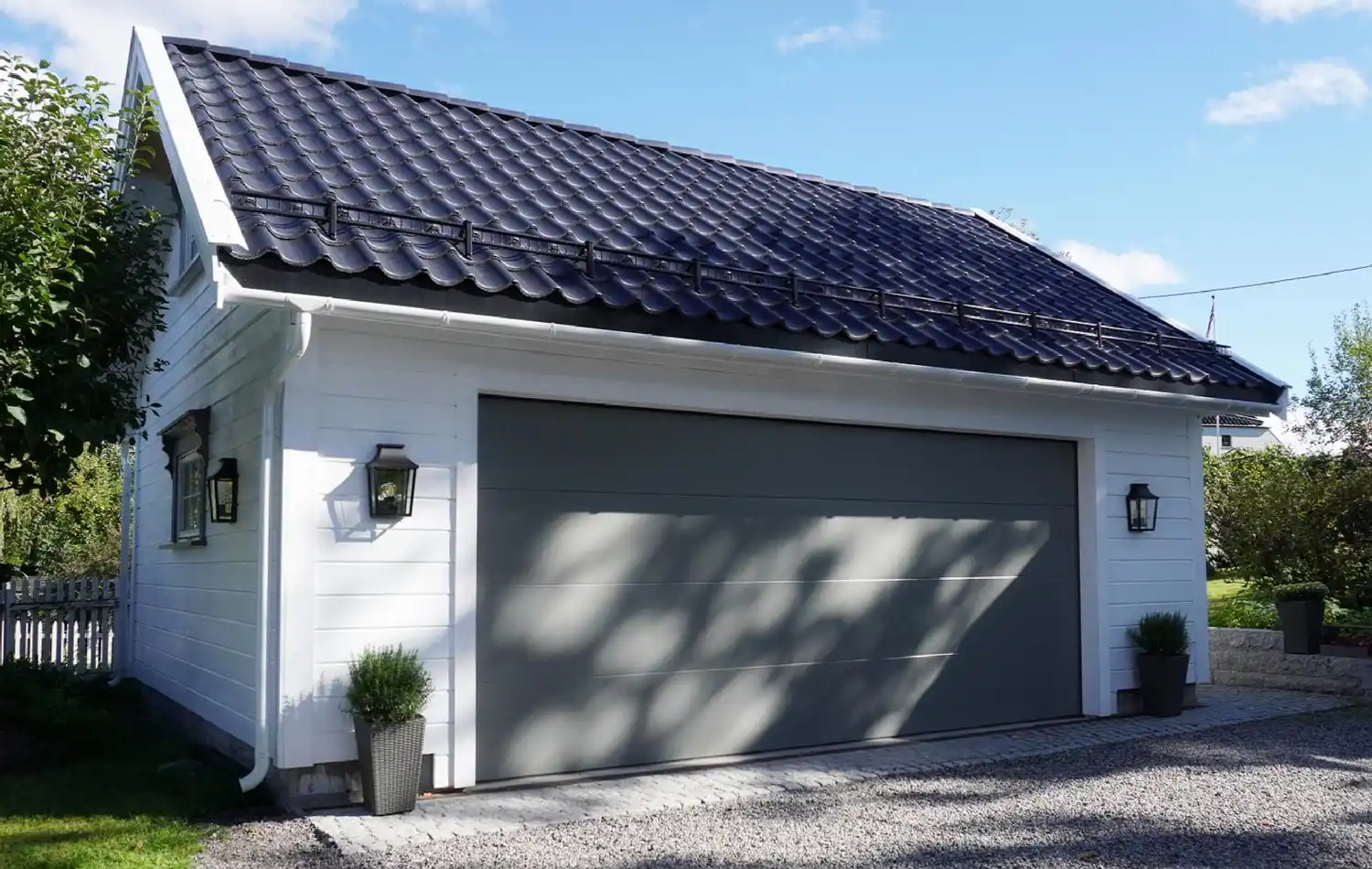 <a href='/bilder/referanser/saltak-dobbel/karlshusgarasjene_saltak_dobbel_013.jpg' download>Last ned bilde</a>